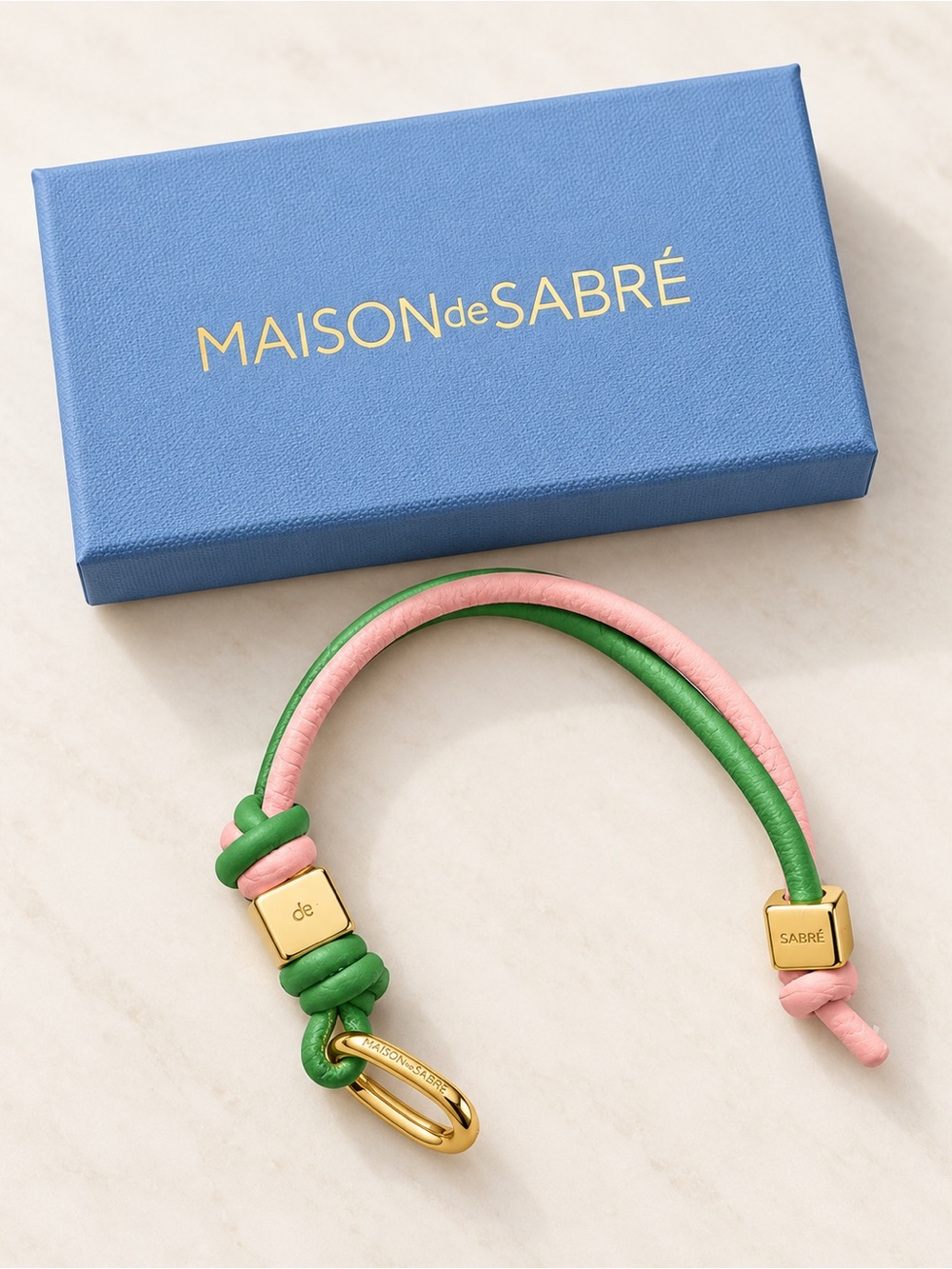 MAISON DE SABRE LEATHER WRISTLET CHARM THE SABREMOJI BLOOM CHARM